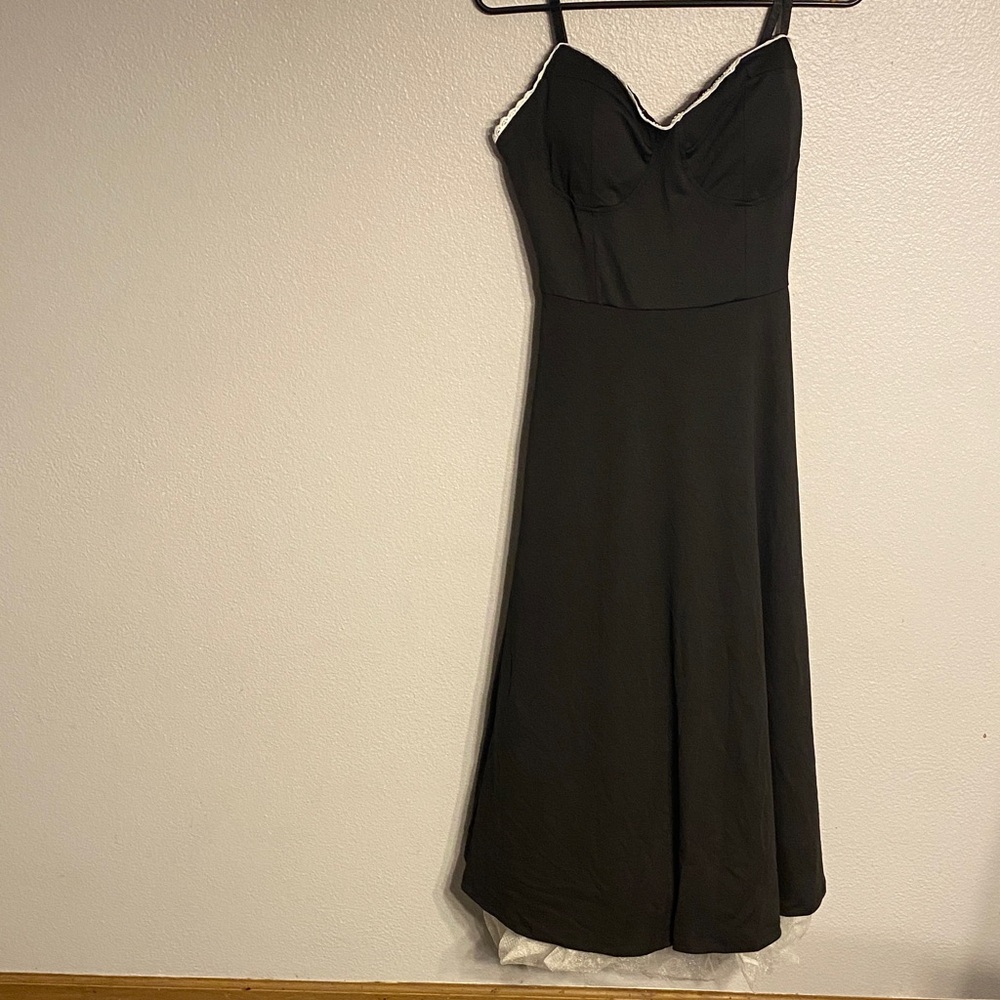 Stylish Black Dress with White Accents